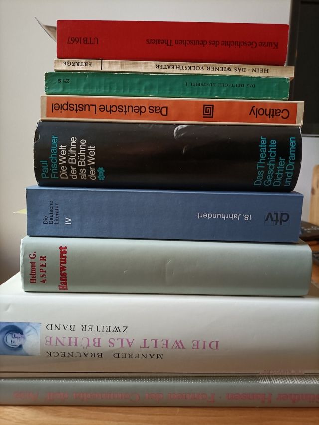 Stack of books related to the topic. the reading list.